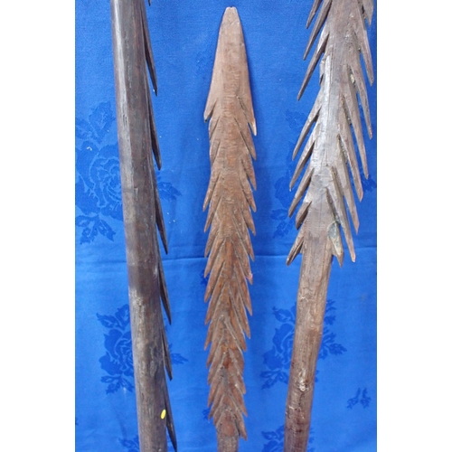 346 - THREE TRIBAL WOODEN FISHING SPEARS 101cm long