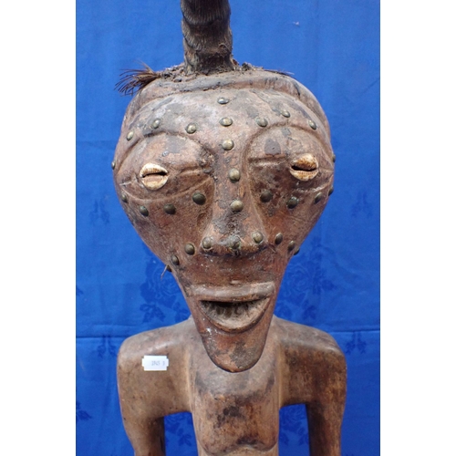 347 - A LARGE AFRICAN TRIBAL STATUE WITH A STUDDED FACE 92cm high