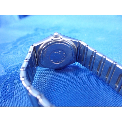 413 - AN OMEGA CONSTELLATION LADIES' WRISTWATCH (some rust inside)