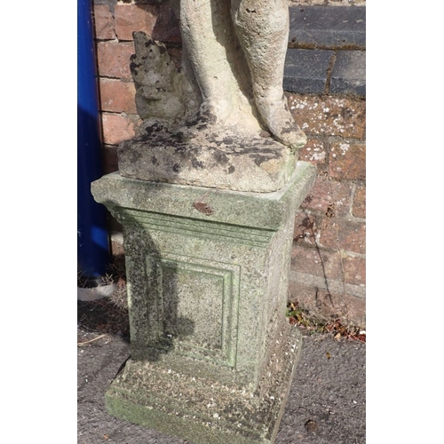 14 - A RECONSTITUTED STONE GARDEN FIGURE OF A BOY on a panelled plinth,116cm high