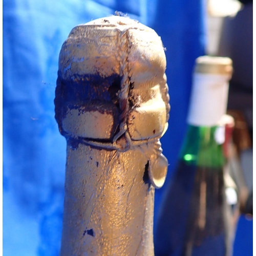 196 - A 1937 'CHARLES HEIDSIECK' EXTRA DRY CHAMPAGNE some leakage, together with a 1991 Brut Roche Lacour,... 