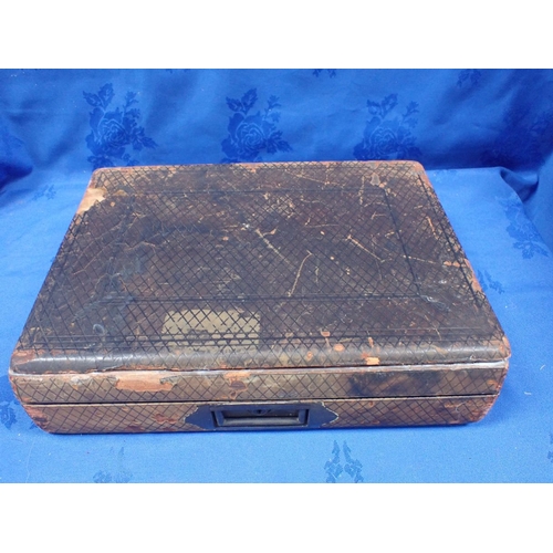 223 - A 19TH CENTURY LEATHER COVERED WRITING BOX with fitted interior, and Bramah lock (no key, examine)