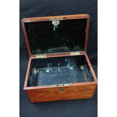 228 - A 19TH CENTURY BRASS-BOUND MAHOGANY DRESSING BOX with a drawer (interior fittings removed)