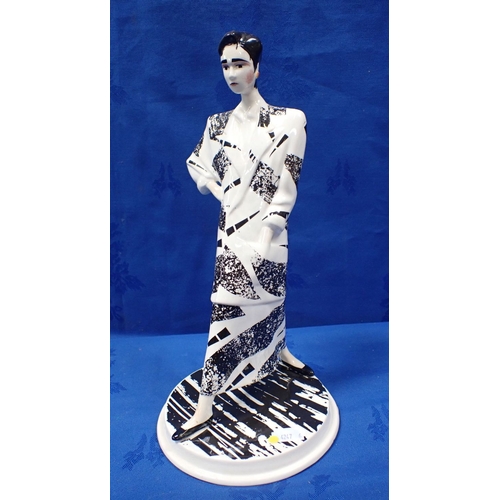 241 - A DENNIS CHINAWORKS FASHION FIGURE modelled by Roger Michell,1985, 32cm high