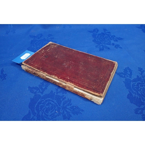 423 - A EARLY 20TH CENTURY PRESSED FLOWER BOOK and a hand written recipe book written on the inside cover ... 