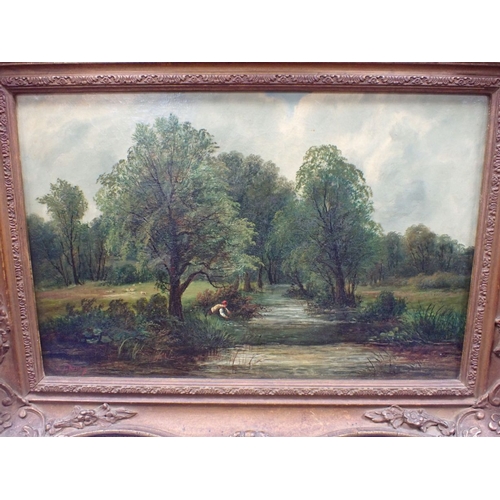 523 - TWO OIL ON CANVAS LANDSCAPE PAINTINGS IN GILT FRAMES both signed