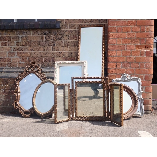 688 - A COLLECTION OF GILT FRAMED MIRRORS including a triple dressing mirror, and one painted (all smell s... 