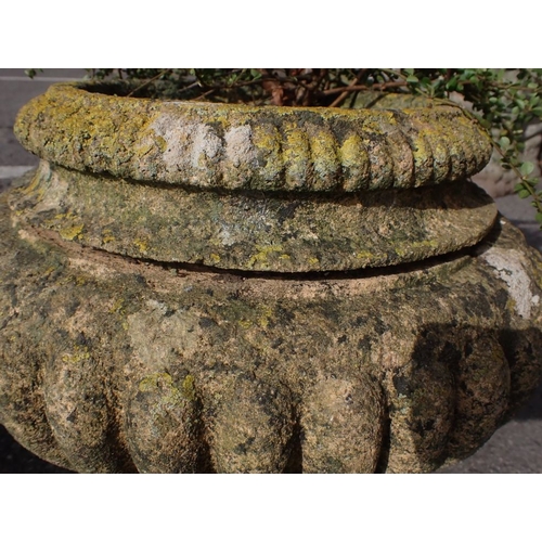 8 - FOUR RECONSTITUTED STONE GARDEN URNS (some damage)