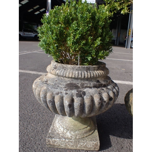 8 - FOUR RECONSTITUTED STONE GARDEN URNS (some damage)