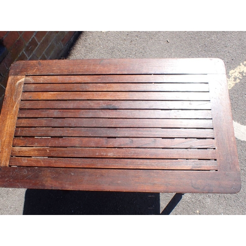 17 - A TEAK GARDEN TABLE MADE FROM H.M.S 'WEYMOUTH'