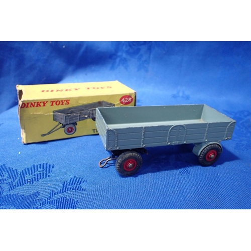 177 - A DINKY TOYS NO.140 MORRIS 1100 (damage to the box) together with a Dinky Toys No.428 Trailer (large... 