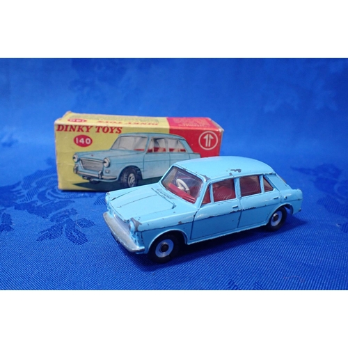 177 - A DINKY TOYS NO.140 MORRIS 1100 (damage to the box) together with a Dinky Toys No.428 Trailer (large... 