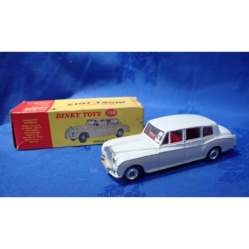 179 - A DINKY TOYS NO.142 JAGUAR MARK X (play worn and damage to box) together with a Dinky Toy No.198 Rol... 