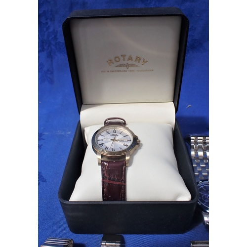 478 - A ROTARY WINDSOR BROWN STRAP WATCH with a collection of men's watches