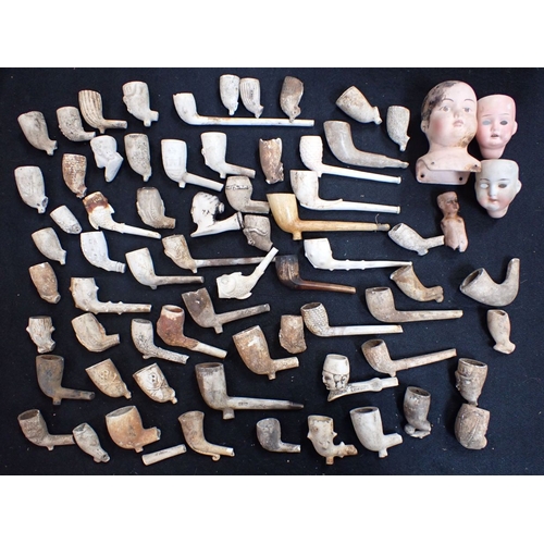 509 - A COLLECTION OF EXCAVATED CLAY PIPES (some complete), and pipe bowls, mostly Victorian, novelties, '... 