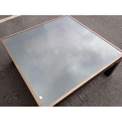 836 - A MODERN COFFEE TABLE, WITH FIBRE OPTIC EFFECT BENEATH THE SMOKED GLASS TOP purchased by the vendor ... 