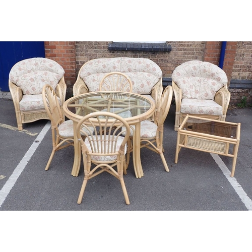 838 - A NINE-PIECE BAMBOO CONSERVATORY SUITE sofa, two armchairs, coffee table, dining table and four chai... 