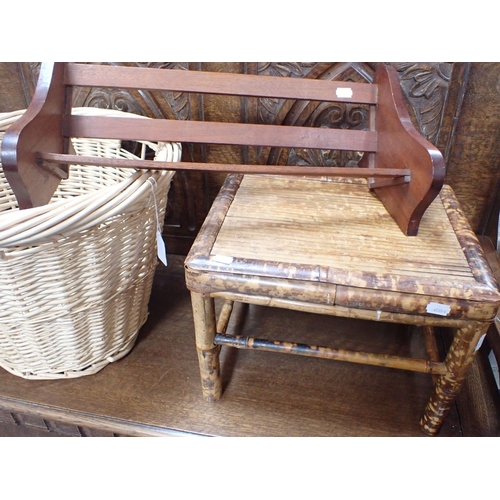 97 - A BAMBOO STAND, A BOOK TROUGH, AND A WICKER BASKET