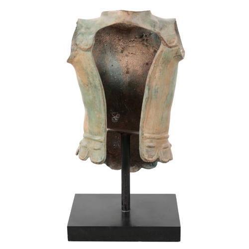 102 - A CAST METAL ROMAN CUIRASS ON STAND 20th century, with bronze effect patina, on a plinth base, 67cm ... 