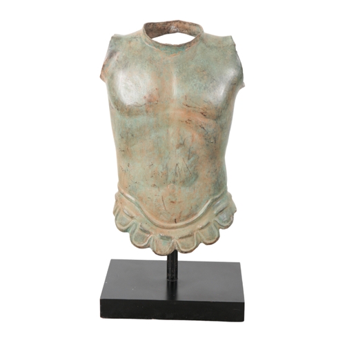 102 - A CAST METAL ROMAN CUIRASS ON STAND 20th century, with bronze effect patina, on a plinth base, 67cm ... 