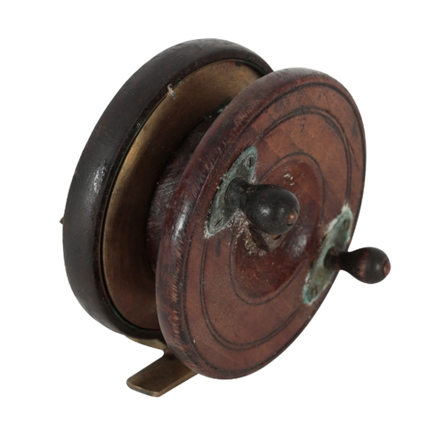 129 - TWO VINTAGE 'STARBACK' FISHING REELS late 19th/early 20th century, the larger 13cm diameter, the sma... 