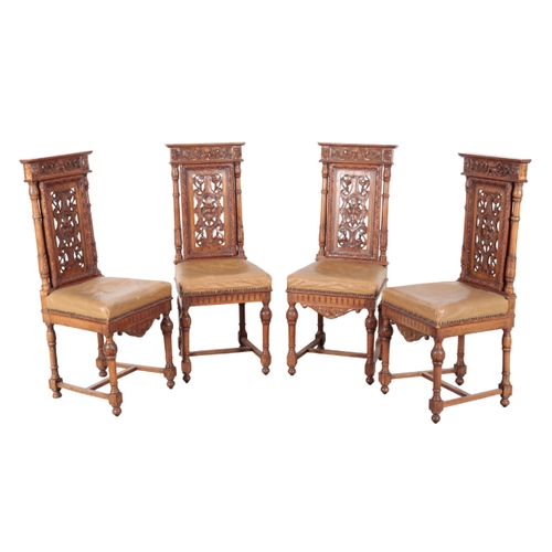 145 - A SET OF SIX VICTORIAN OAK DINING CHAIRS 19th century, including two armchairs, each with heavily ca... 