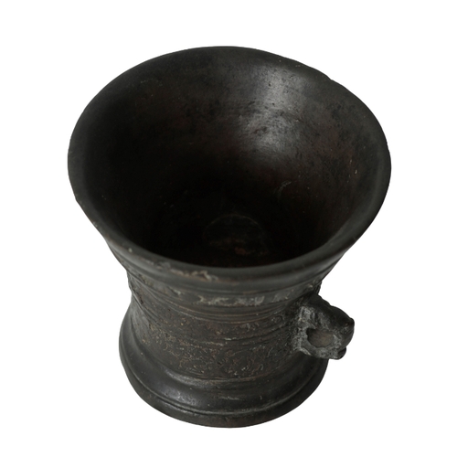 279 - A BRONZE MORTAR DATED '1603' 17th century, with flared top rim, over a turned and cast body, with tw... 