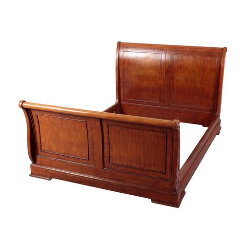 280 - A MODERN WALNUT FINISH SLEIGH BED the panelled head and foot inlaid with mother of pearl and fluted ... 