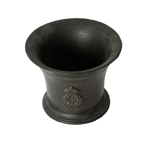 283 - A LATE 17TH CENTURY BRONZE MORTAR WITH PESTLE with a flared rim over a tapering body, with applied c... 