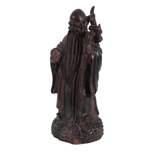 285 - A CHINESE CARVED HARDWOOD FIGURE OF SHOULAO, QING DYNASTY early 20th Century, 39cm high