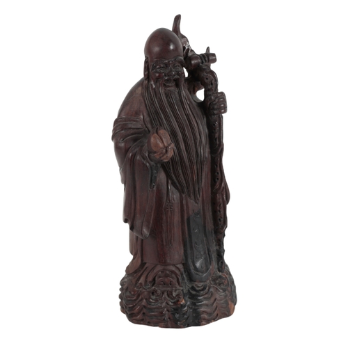 285 - A CHINESE CARVED HARDWOOD FIGURE OF SHOULAO, QING DYNASTY early 20th Century, 39cm high