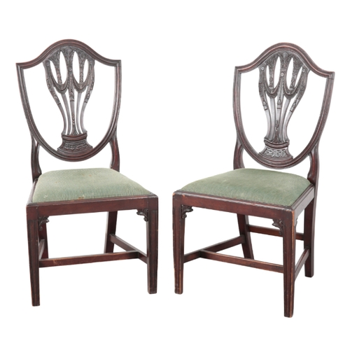 290 - A SET OF EIGHT MAHOGANY DINING CHAIRS IN THE MANNER OF GEORGE HEPPLEWHITE including two elbow chairs... 