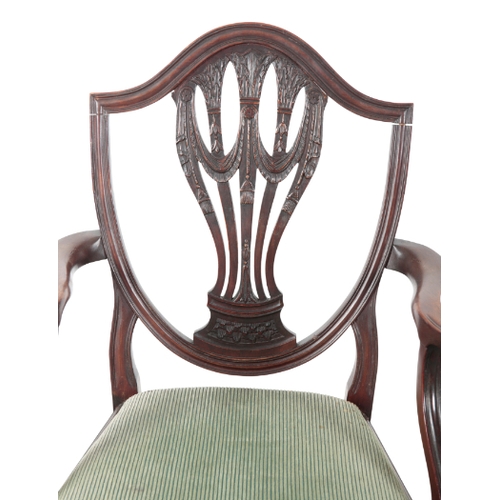 290 - A SET OF EIGHT MAHOGANY DINING CHAIRS IN THE MANNER OF GEORGE HEPPLEWHITE including two elbow chairs... 