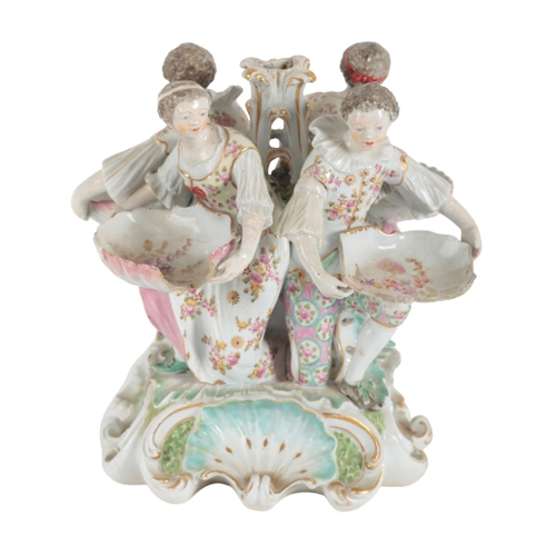 317 - AN 18TH CENTURY DUESBURY & CO DERBY PORCELAIN SWEETMEAT DISH c. 1765, modelled with four servants in... 