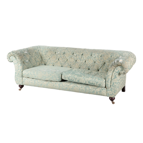 325 - A PAIR OF MODERN CHESTERFIELD TYPE SOFAS with floral print button back damask covers, on turned stai... 