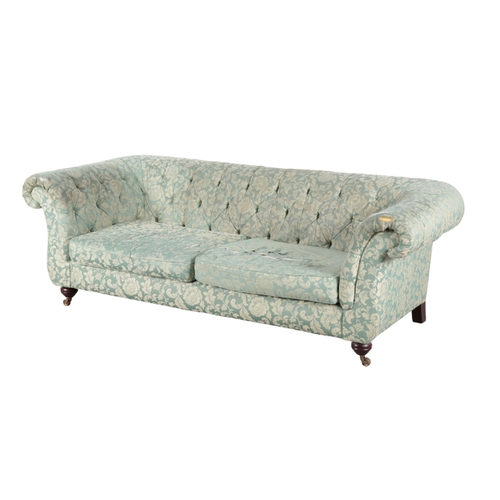 325 - A PAIR OF MODERN CHESTERFIELD TYPE SOFAS with floral print button back damask covers, on turned stai... 