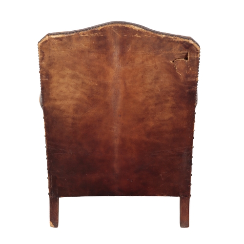 342 - A FRENCH ARMCHAIR early 20th century, with studded leather covers, on moulded front legs, 85cm high ... 