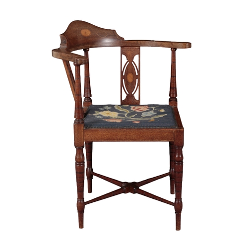 347 - AN EDWARDIAN MAHOGANY CORNER ARMCHAIR inlaid with paterae to the cresting rail and back splats, with... 