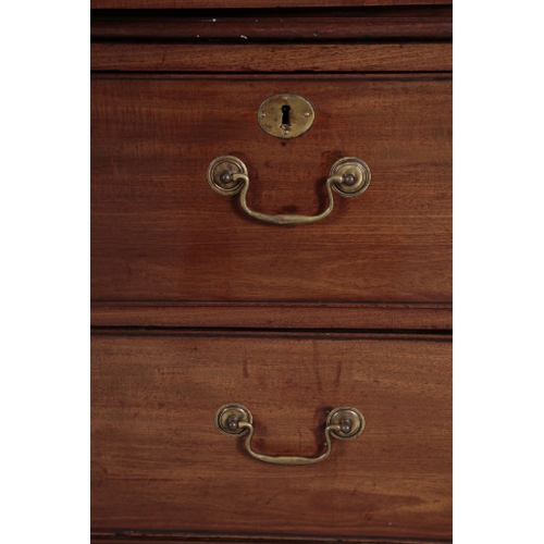 348 - A GEORGE III MAHOGANY LINEN PRESS the top section with a moulded pediment over figured mahogany cupb... 