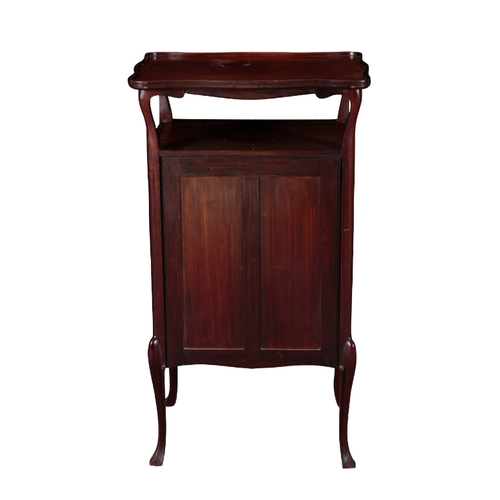 350 - AN EDWARDIAN MAHOGANY MUSIC CHEST the shaped top with a moulded and raised edge, with five drawers b... 