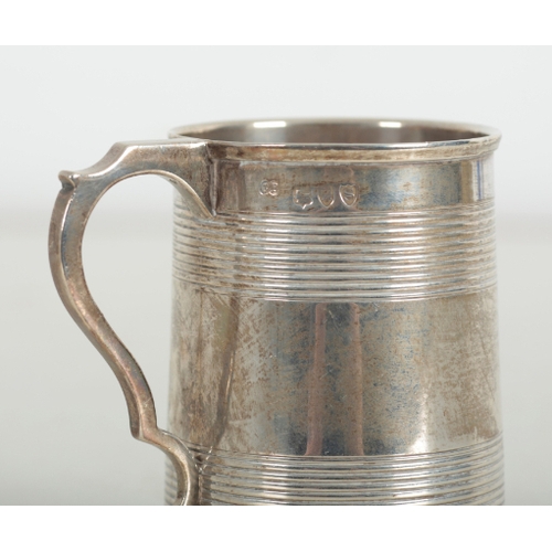 11 - A VICTORIAN SILVER MUG BY CHARLES BOYTON London, 1893, 9cm high, c.152g; together with another silve... 