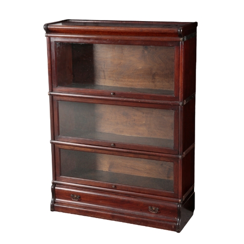 150 - A MAHOGANY AND GLAZED GLOBE WERNICKE BOOKCASE the three graduated sections each with glazed fronts, ... 