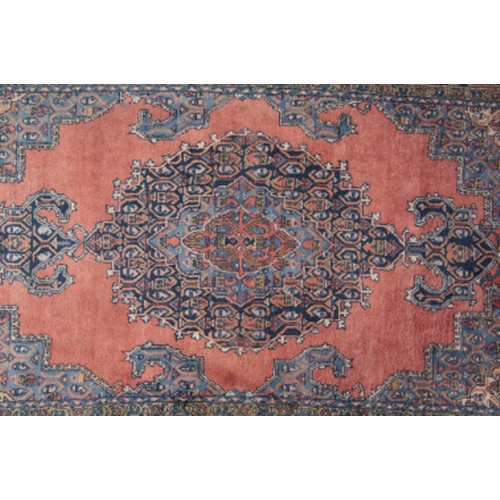 157 - A MAZLAGHAN NORTH WEST PERSIAN RUG early/mid-20th Century, woven in blue and muted colours with geom... 