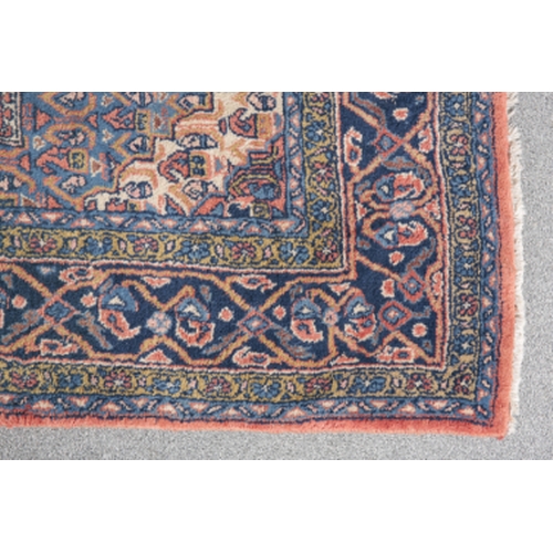 157 - A MAZLAGHAN NORTH WEST PERSIAN RUG early/mid-20th Century, woven in blue and muted colours with geom... 