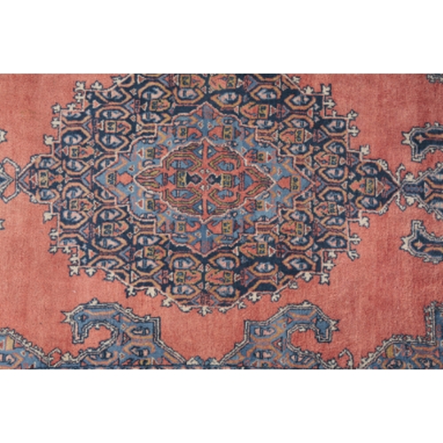 157 - A MAZLAGHAN NORTH WEST PERSIAN RUG early/mid-20th Century, woven in blue and muted colours with geom... 