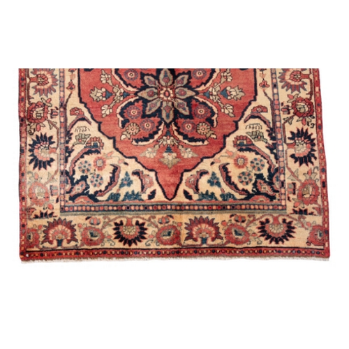 163 - A CENTRAL PERSIAN BAKHTIAR KELLEH SIZE CARPET woven in blue, turquoise and tan with floral medallion... 