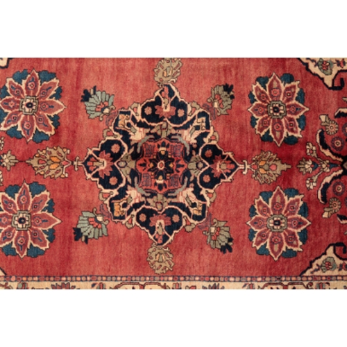 163 - A CENTRAL PERSIAN BAKHTIAR KELLEH SIZE CARPET woven in blue, turquoise and tan with floral medallion... 