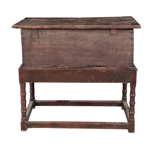 176 - A CHARLES II STYLE OAK CHEST ON STAND incorporating 17th century and later elements, the hinged lid ... 