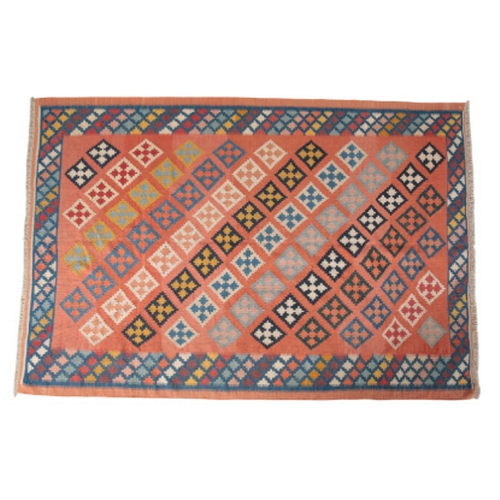 184 - A SOUTH WEST PERSIAN QASHGAI KILIM woven in colours with diagonal rows of lozenges, on an ochre grou... 