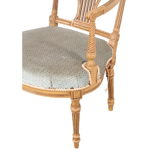 192 - A GEORGE III STYLE PAINTED ARMCHAIR 20th century, with a pierced lyre back, over a bowfront seat, on... 